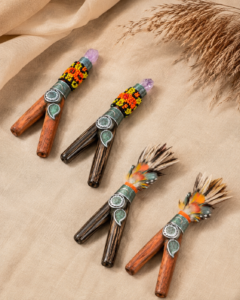 Handcrafted Kuripe self-applicator with artisan beadwork and natural wood
