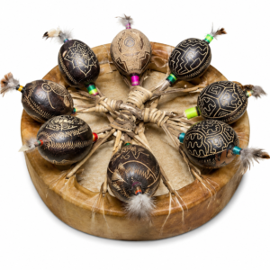 Handcrafted ceremonial rattle with natural materials and artisan details